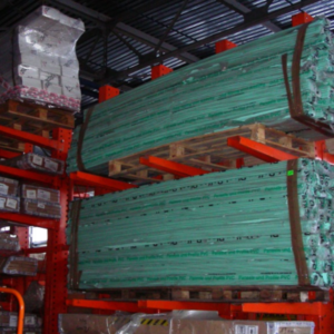 Cantilever racks loaded with logs on pallets