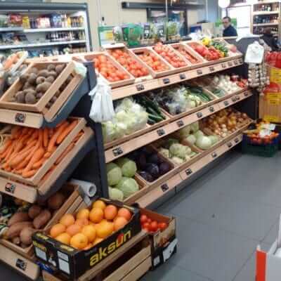 Store shelving with a food island